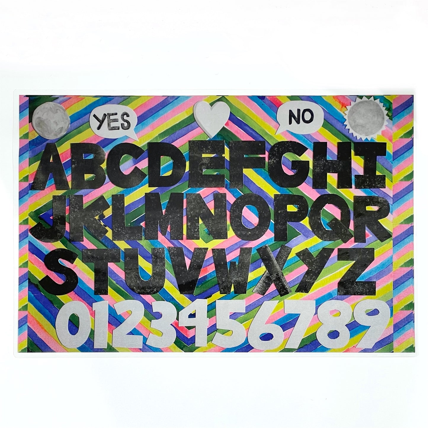 Ouija board with planchette / Frankie Martin