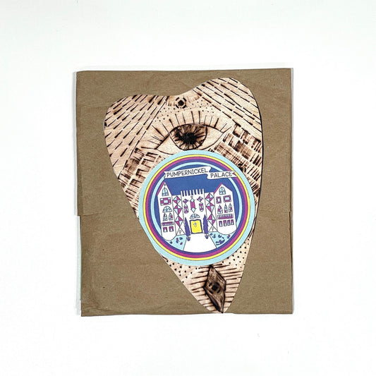 Ouija board with planchette / Frankie Martin