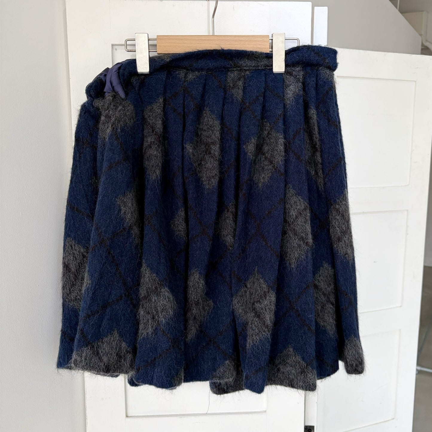 TWISTED PLEATS KNIT SKIRT / NAVY / ニットプリーツスカート