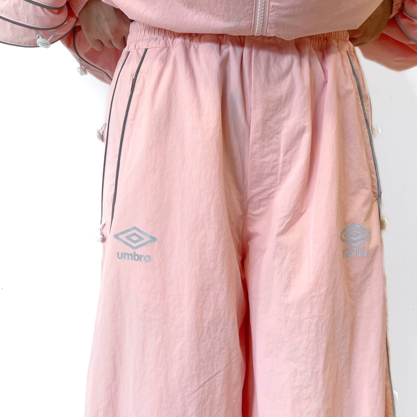 KIDILL × UMBRO COLLABORATION WIZARD  TRACK PANTS / PINK / トラックパンツ