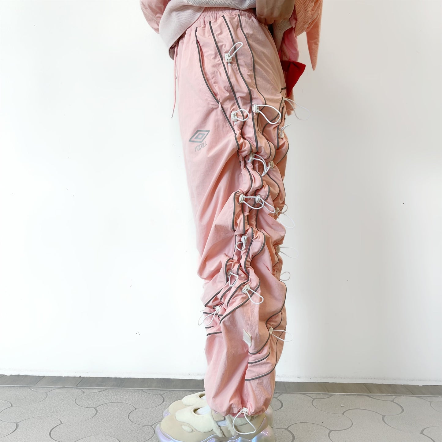 KIDILL × UMBRO COLLABORATION WIZARD  TRACK PANTS / PINK / トラックパンツ