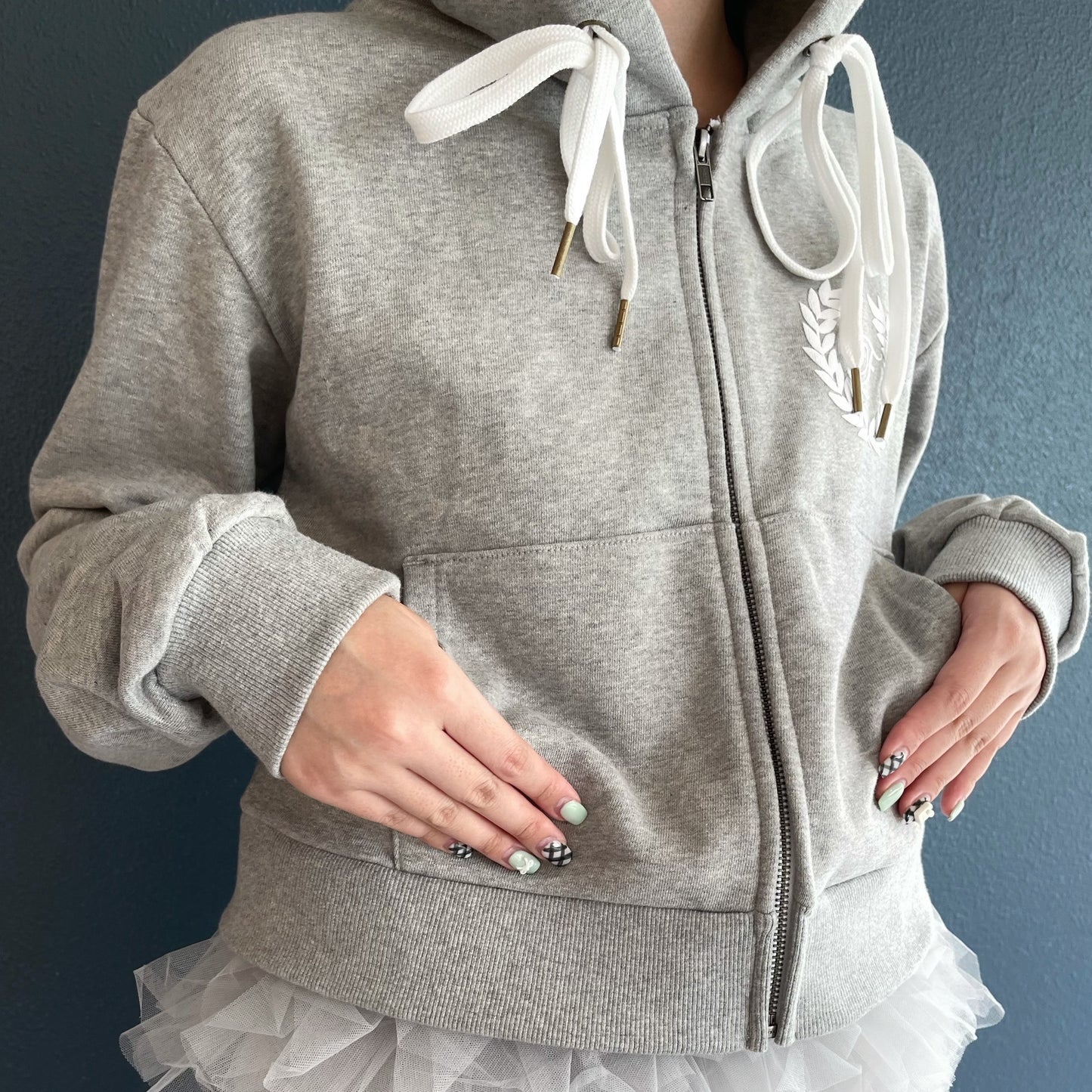 [fa.er.ie] eyelet corset hood zip-up / melange grey / コルセットフードジップアップ