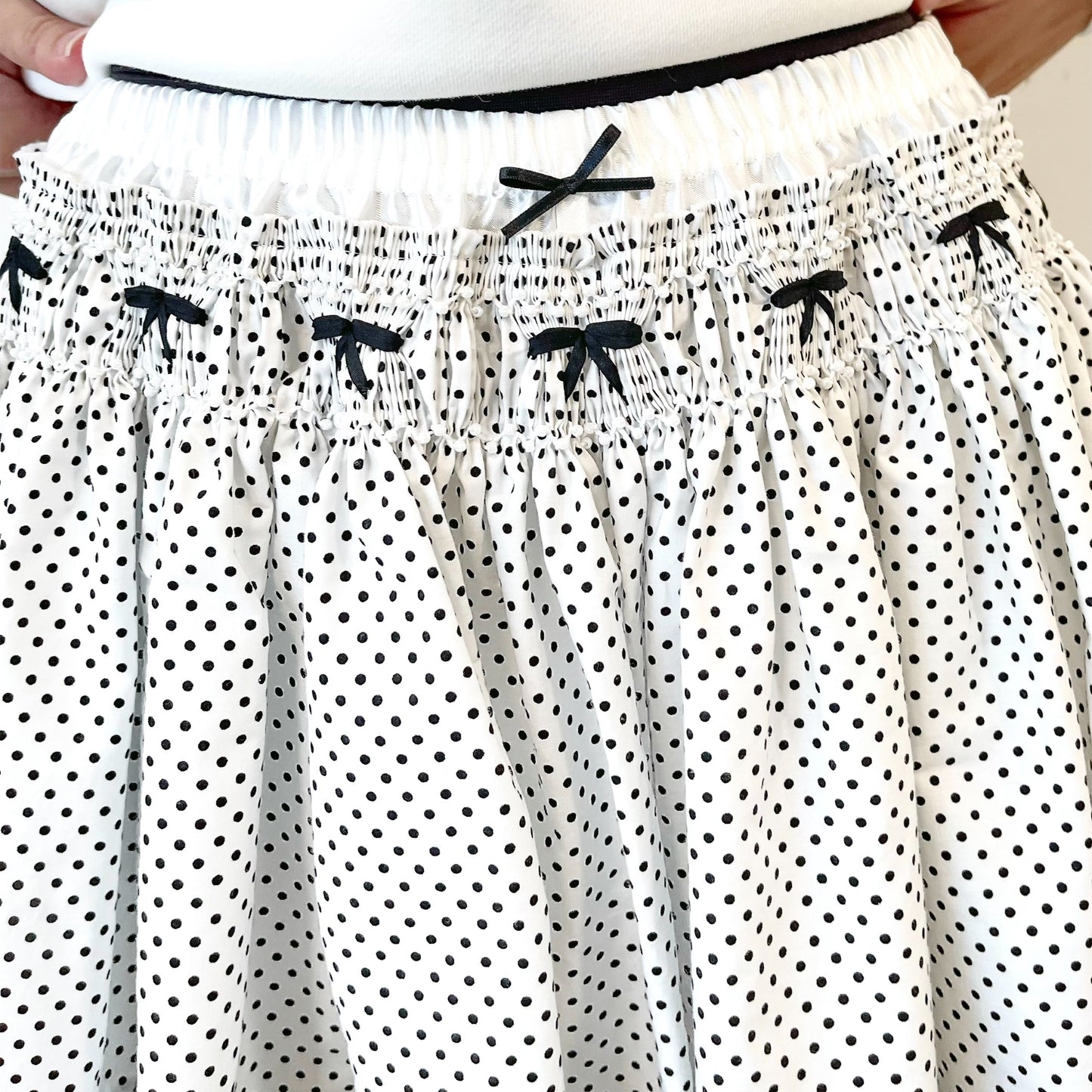 Briefs embroidery skirt / White / スモッキングスカート