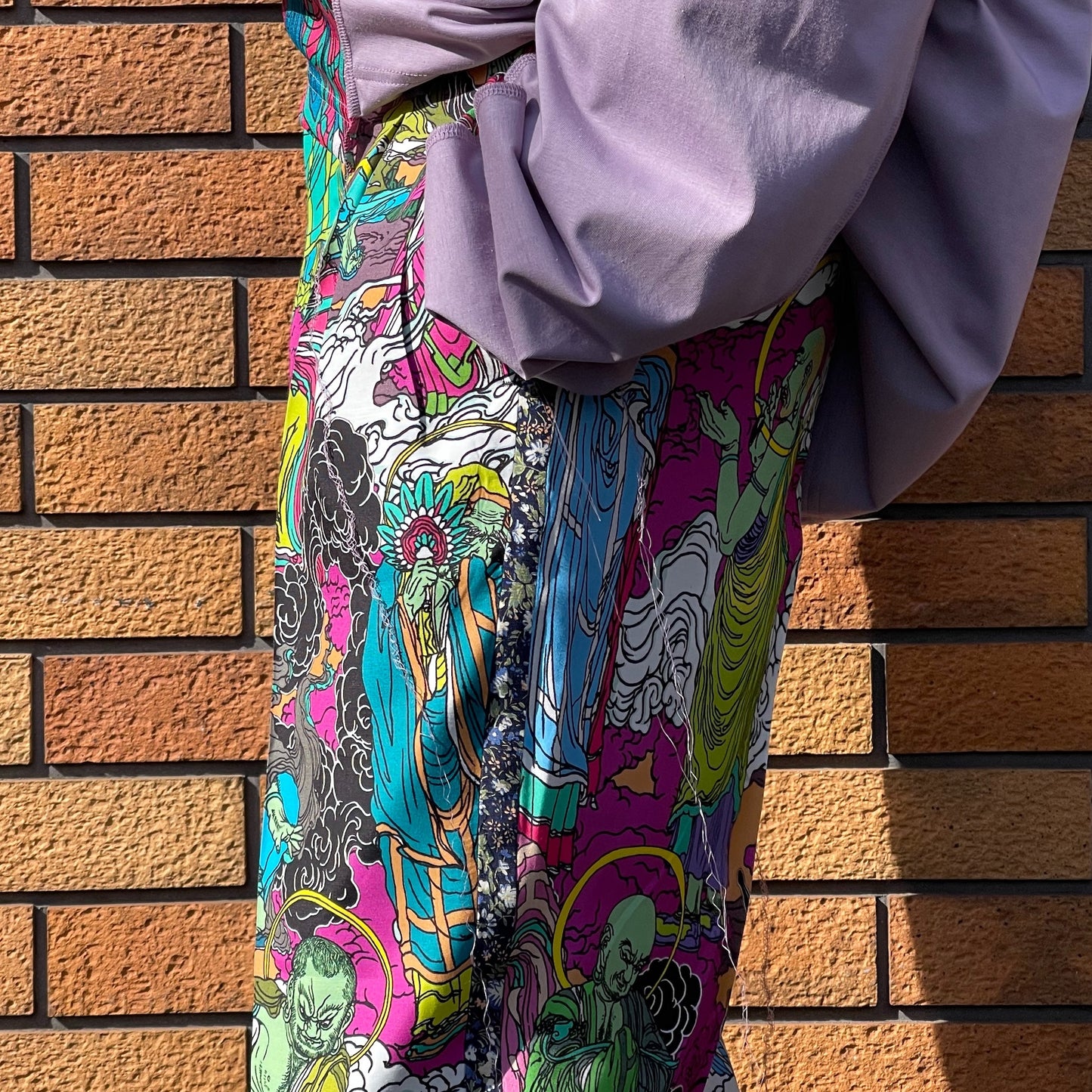INVERTED TUCK TROUSERS / BUDDHA / プリントタックトラウザー